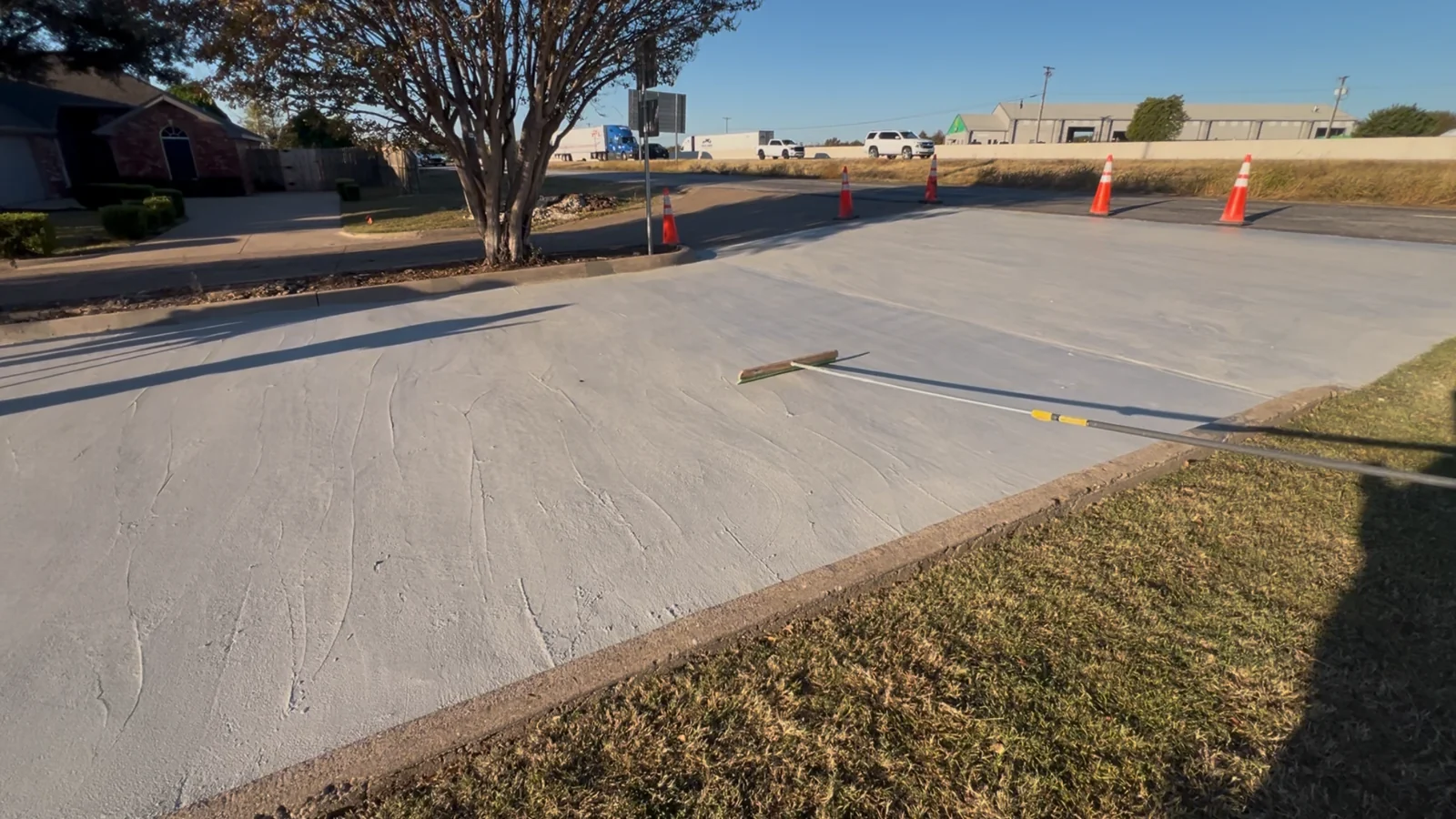 Finished PetraTec HP resurfacing installation on a roadway repair area