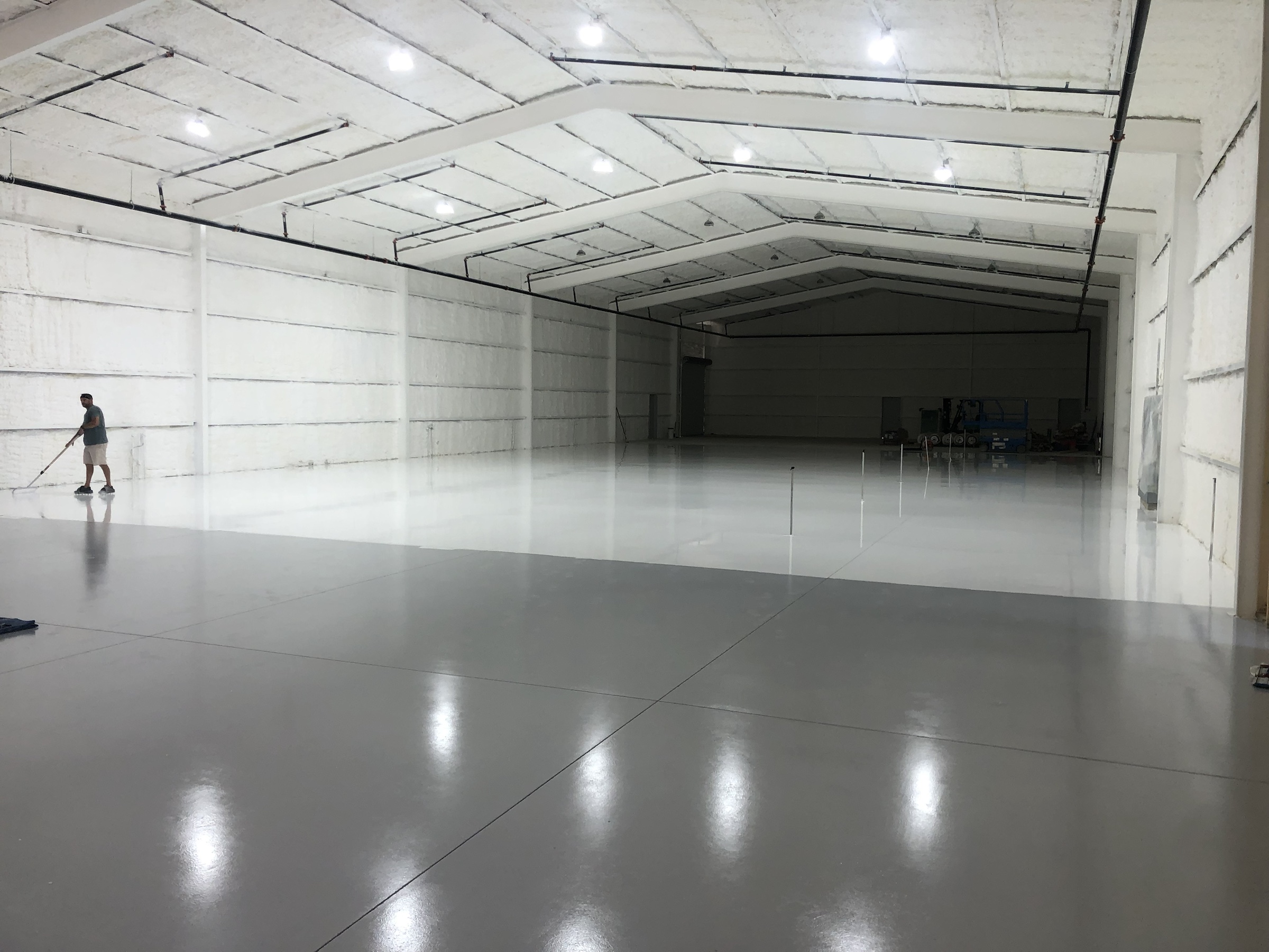 Large light gray Rezena Classic floor in an industrial building